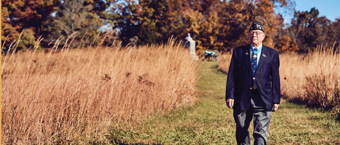 Hershel Williams walking in field