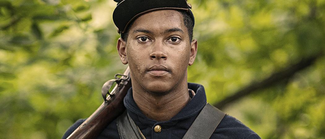 A reeactor dressed as a member of the United States Colored Troops