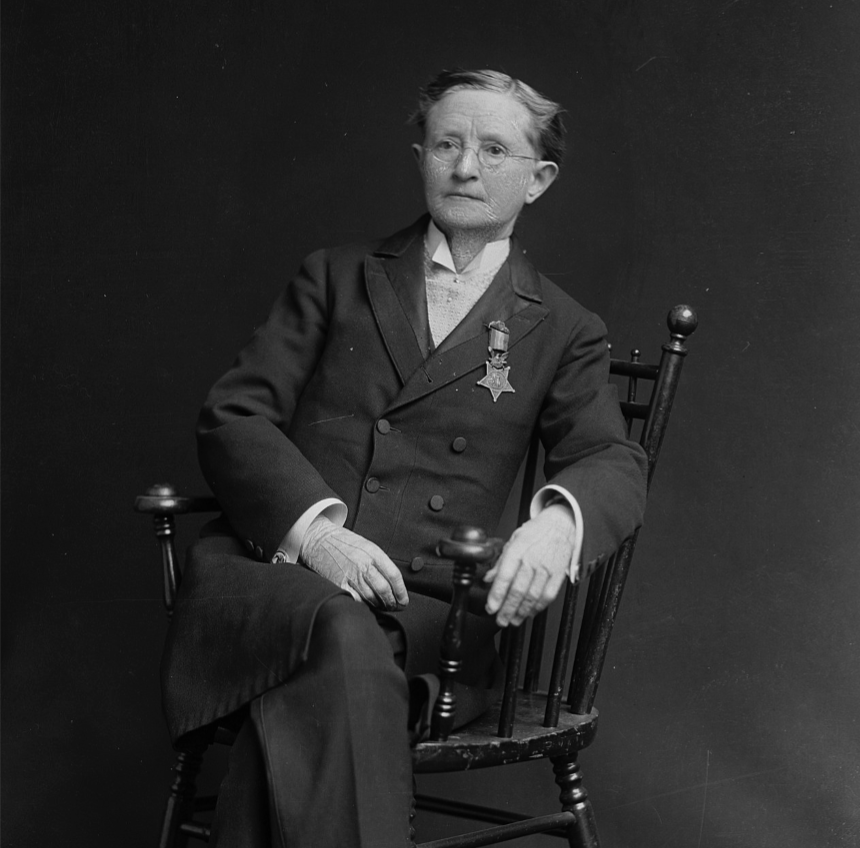 Dr. Mary Edwards Walker seated with her Medal of Honor